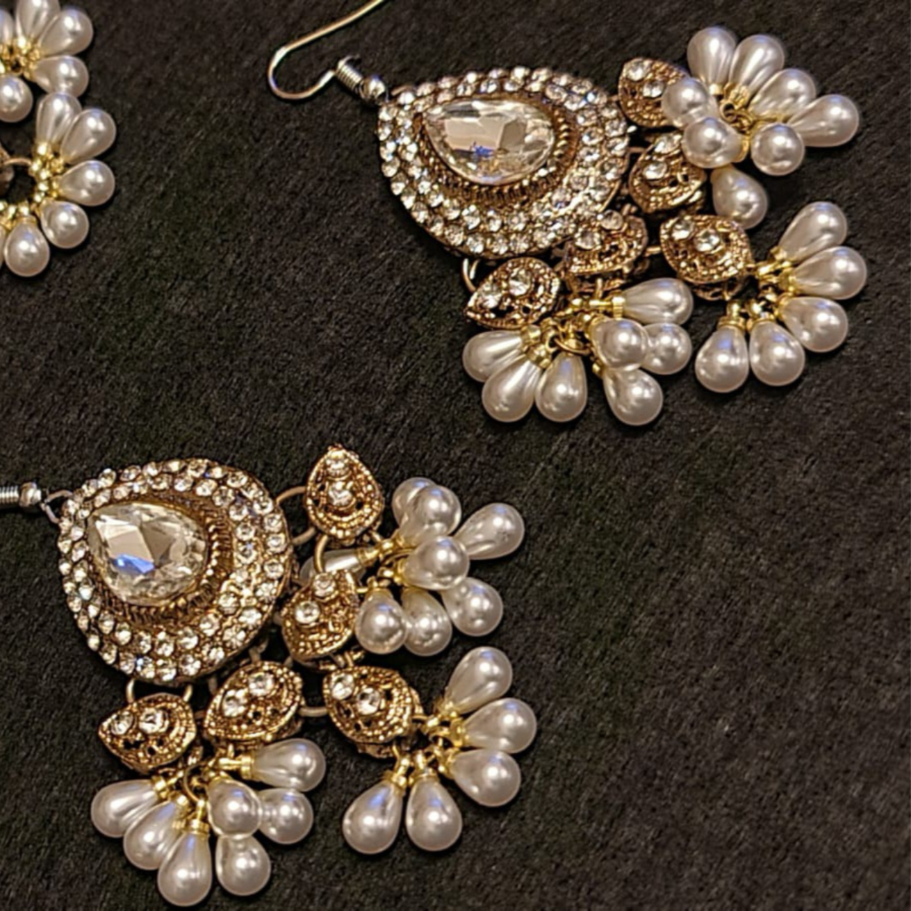 Traditional diamond cut stones and pearl  earrings, tikka set