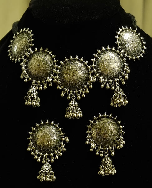 Round oxidized silver ethnic choker with earrings.