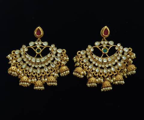 Gold plated chandbali with kundan and jhumkis.