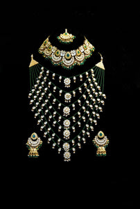 Designer kundan gold plated emerald bridal set.