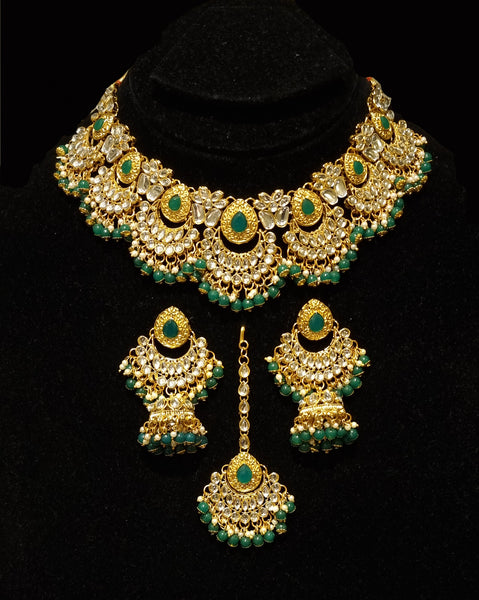 Designer kundan gold plated emerald bridal set.