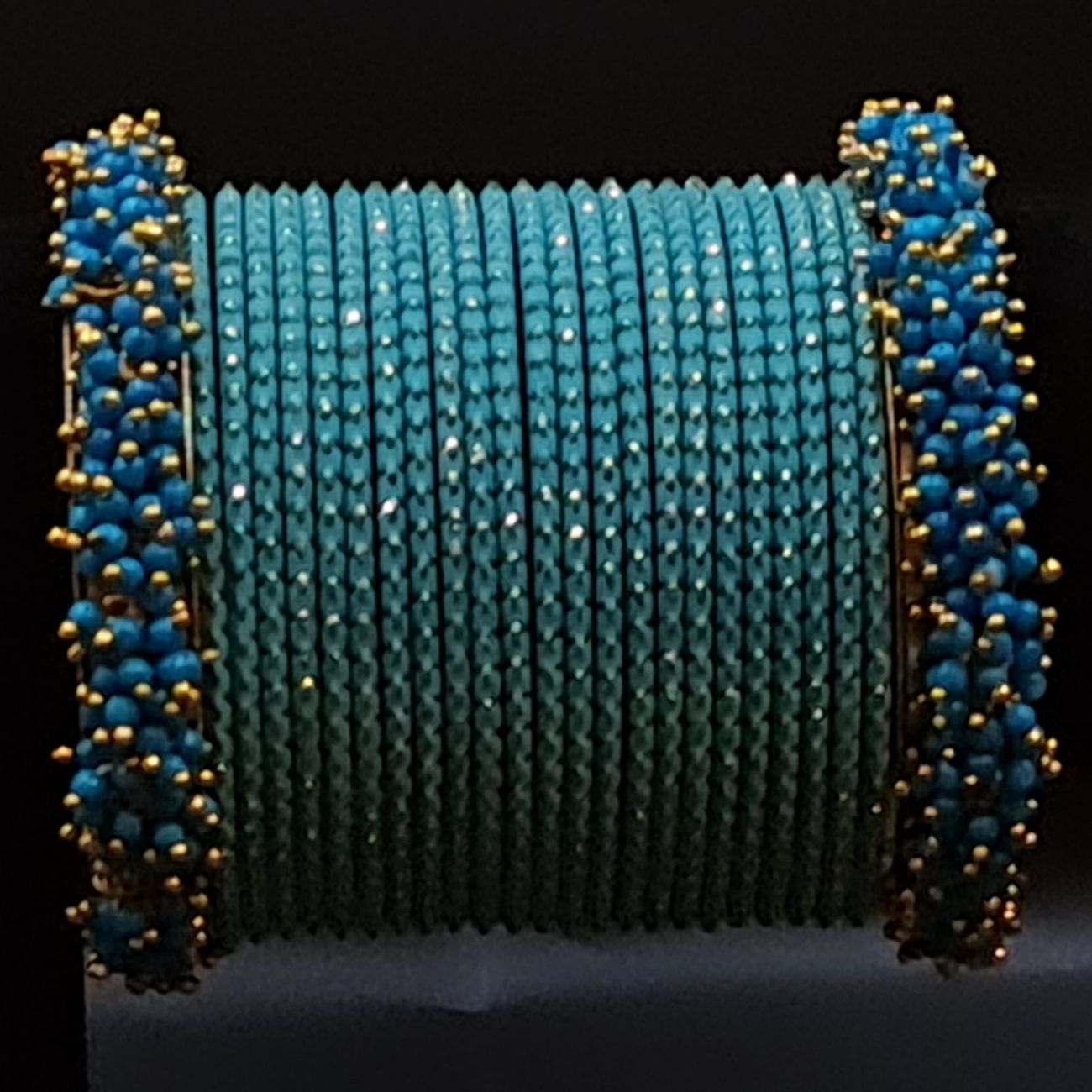 Turquise blue colour bangles set with deep blue beads cluster pearl kadas