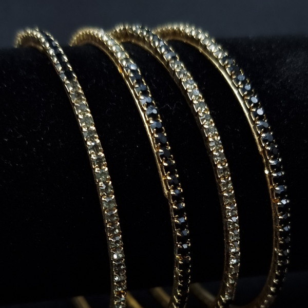 Designer rhinestone metal bangles.