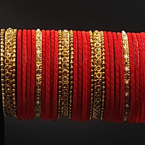 Beautiful red velvet bangles stack with stone studded gold kadas
