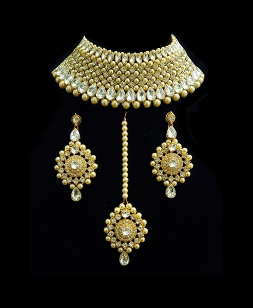 Pearls with pearl Gold Tone set with earrings and tikka.